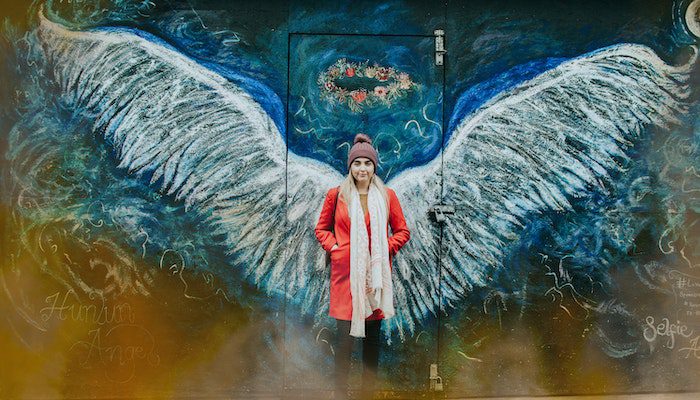 woman wings arts chalk painting addiction recovery